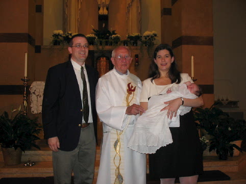 2004_05_23 Cate's Baptism Parents Randy Bethany and the pastor.jpg